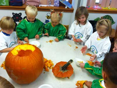 Children from Zion's weekday ministries carving a pumpkin